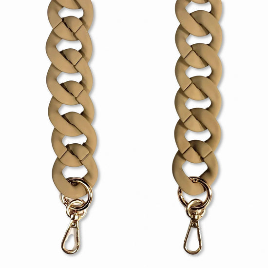 A close-up view of a Taupe-colored oval link long phone chain made of matte resin with golden carabiners.